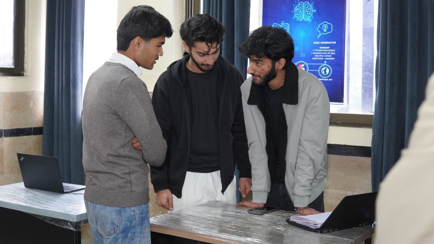 Students discussing ideas and projects on campus at UOR.